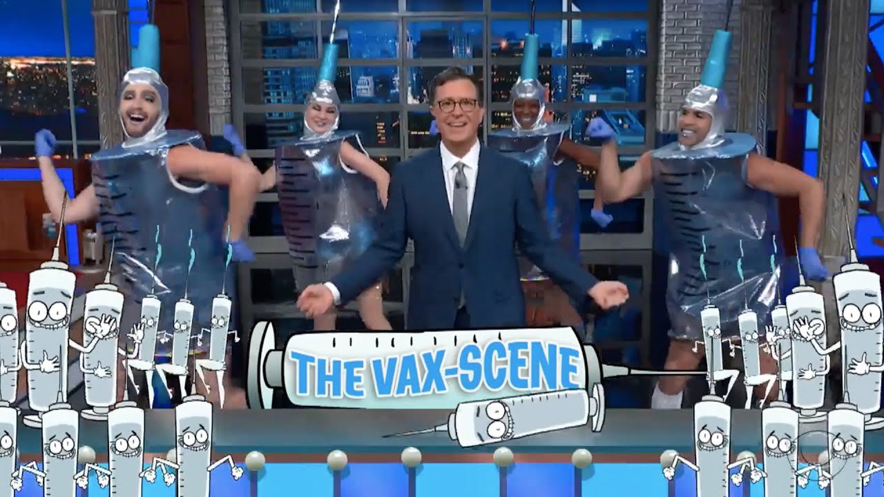 When You Can't Beat Them Screenshot from The Colbert Show showing Colbert dancing with extras who are dressed as syringes the promotion of in an effort to promote the Frankenshot.