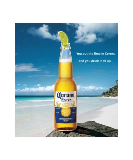 Corona Extra bottle with a lime on a tropical beach