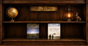 Mikey's Library bookshelf with previous selections: Ghost Rider by Neil Peart and The Wright Brothers by David McCullough